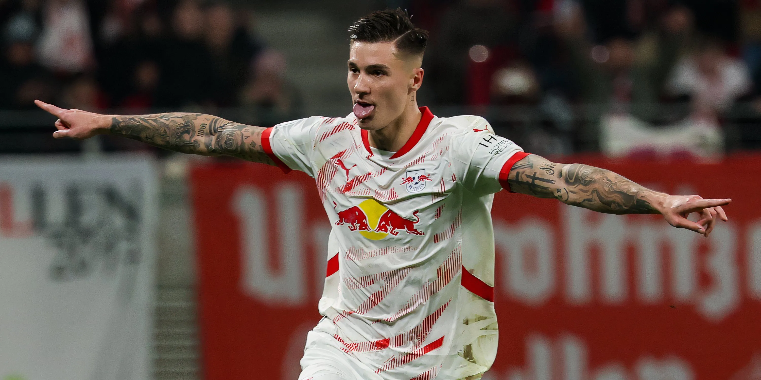 Benjamin Sesko ăn mừng sau khi ghi bàn cho RB Leipzig tại giải Bundesliga